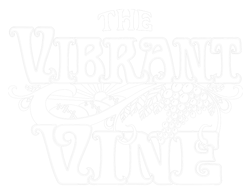 The Vibrant Vine Winery Scrolled light version of the logo (Link to homepage)